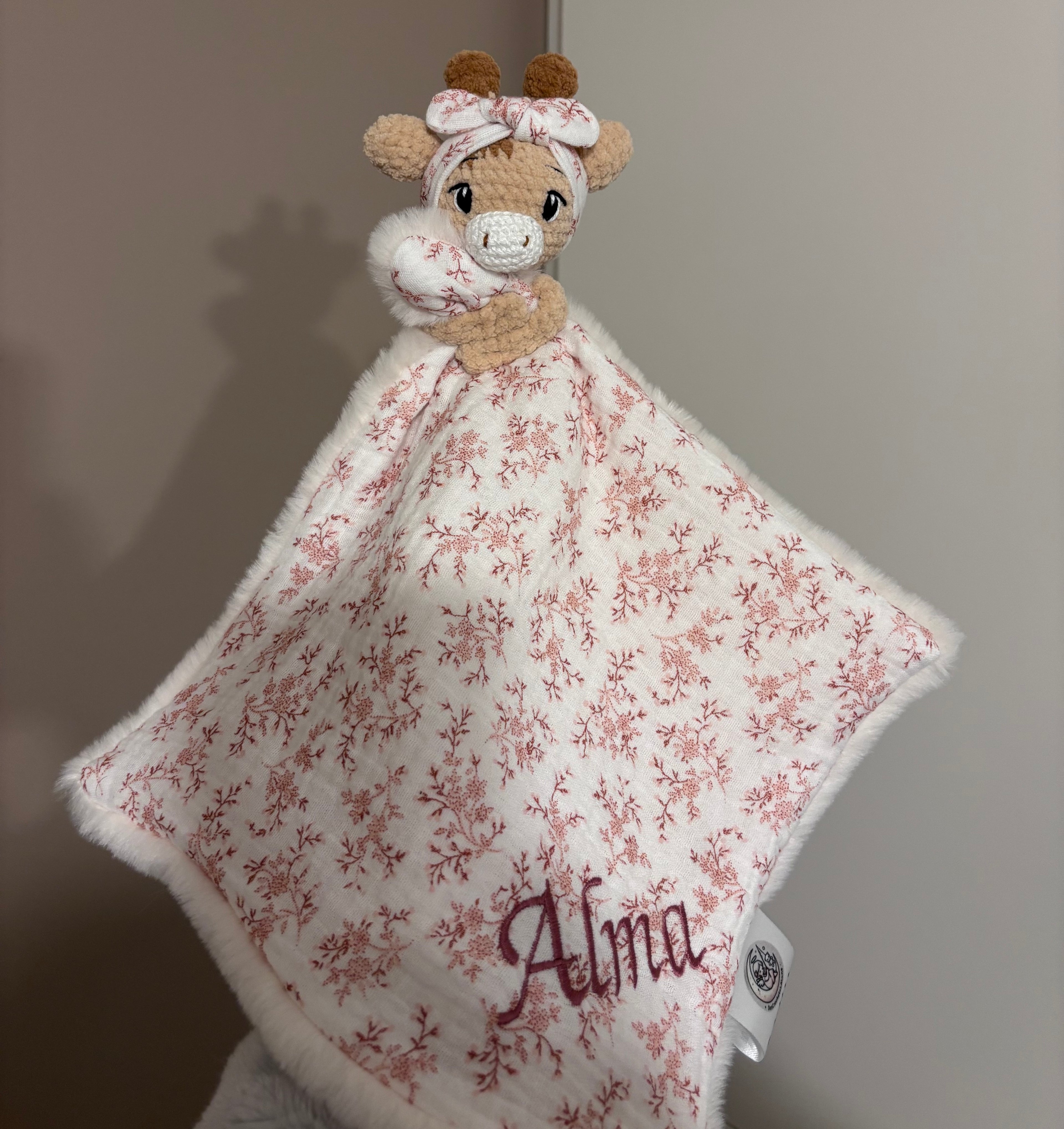 Doudou girafe avec bandeau cheveux
